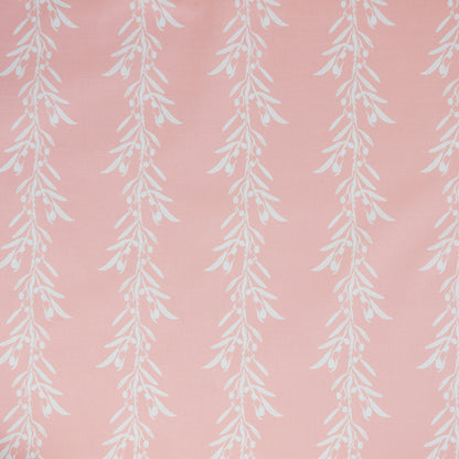 White leaf pattern on a blush coloured background. Fabric suitable for interiors projects