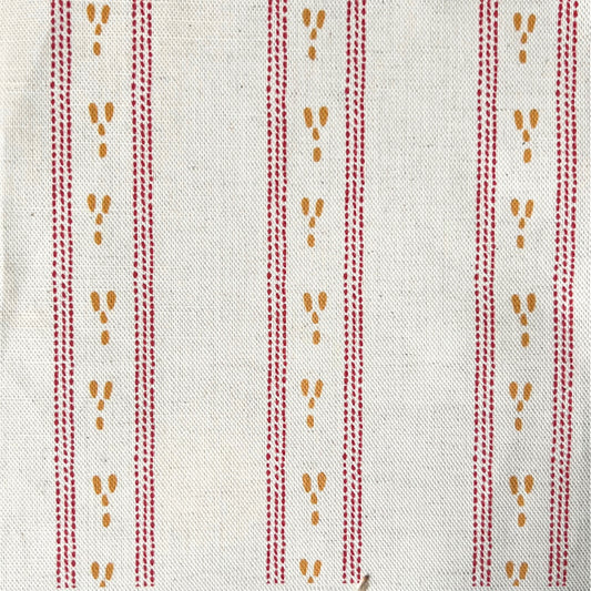 A dashed stripe design printed onto a natural colour fabric base for use in interiors projects